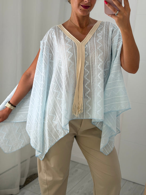 Blusa fluida azul bebé