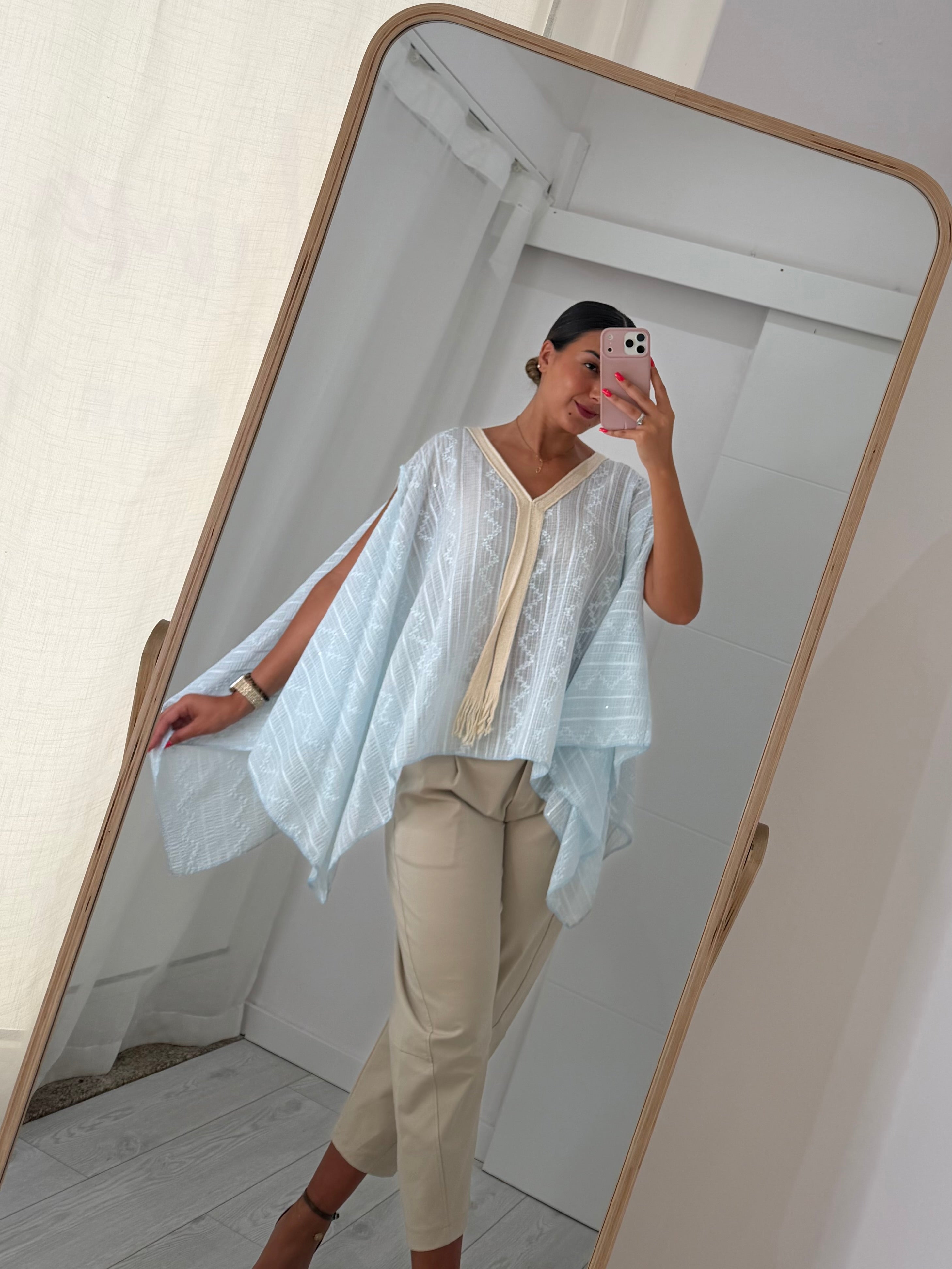 Blusa fluida azul bebé