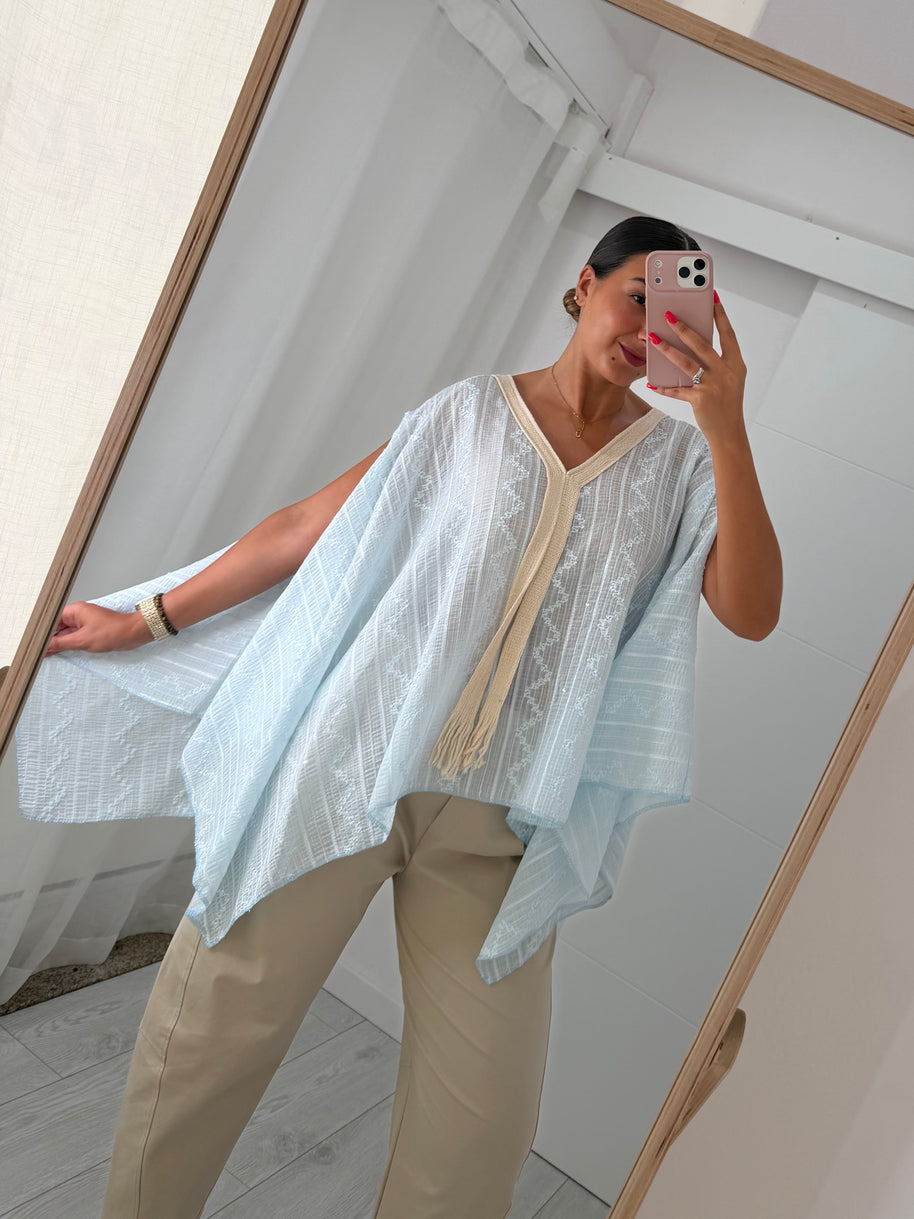 Blusa fluida azul bebé