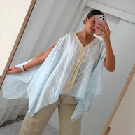 Blusa fluida azul bebé