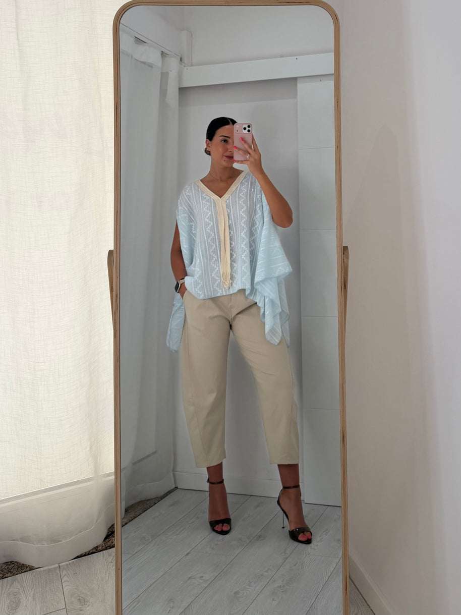 Blusa fluida azul bebé