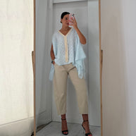 Blusa fluida azul bebé